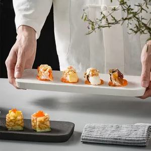 Japanese style rectangular ceramic sushi plate with textured matte finish and rounded corners