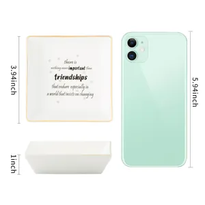 Square ceramic jewelry tray with gold rim and friendship quote for necklace storage