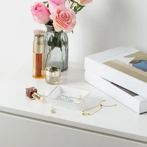 Detail of square ceramic jewelry tray with gold trim and Mother's Birthday message