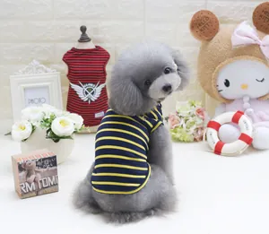 Three-color striped dog vest in blue and yellow cotton with wing crest detail