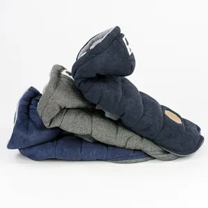 Quilted warm pet sleeping bag in navy and grey with soft fleece lining and thick padding