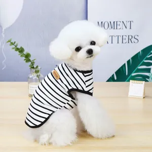 Classic black and white striped cotton vest for dogs and cats on a white puppy