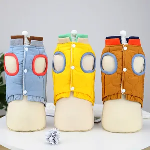 Quilted pet cotton vests in blue, yellow, and brown with rib trim and snap buttons