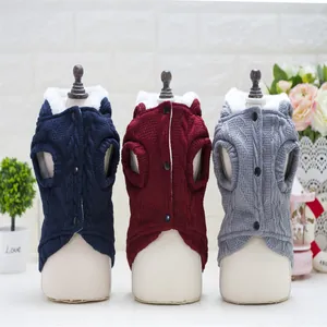 Three colors of cable knit dog vests with fleece lining and front buttons for winter warmth