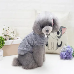 Classic grey cable knit dog sweater for small pets in a cozy home setting