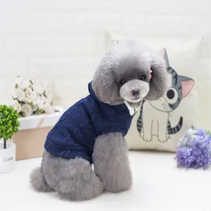 Navy blue cable knit dog hoodie sweater for small pets on a toy poodle