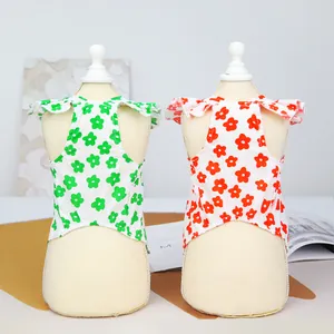Two-pack floral pet vest set with daisy patterns and ruffled shoulders for cats and dogs