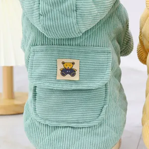 Quilted light green corduroy pet hoodie with a cute teddy bear pocket for dogs and cats