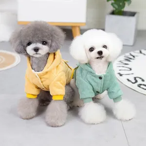Warm corduroy hooded pet jackets in yellow and mint green with snap buttons for small dogs