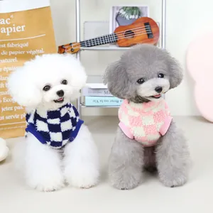 Checkered warm fleece pet vests in pink and blue for dogs and cats during winter season