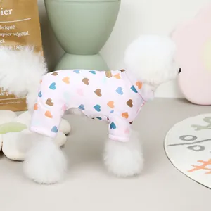 Quilted pet jumpsuit for small dogs with colorful heart prints in soft pink