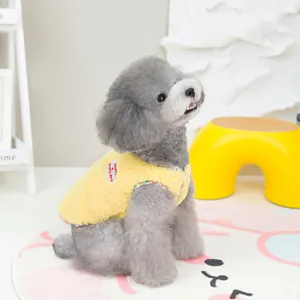 Yellow fleece pet vest with floral trim and Happy Everyday embroidery for small dogs