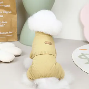 Detail of ginger yellow quilted pet jumpsuit with leather patch for small dogs