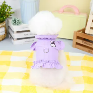 Detail of purple pet dress with rabbit embroidery and D-ring for leash attachment