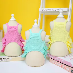 Three-piece ruffled pet summer dresses in pink, mint, and yellow for small dogs and cats