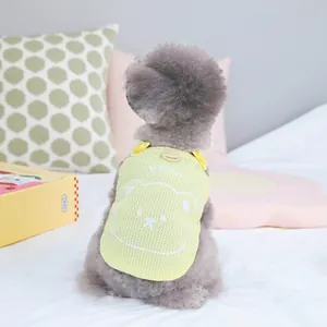 Detail of yellow mesh dog vest with bear print and soft waffle texture for small pets