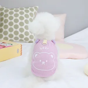 Pink waffle fabric pet vest with cartoon bear design and D-ring for leash attachment