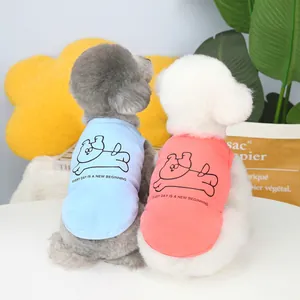 Two-pack pet summer vests for small dogs in light blue and pink with cute dog graphics