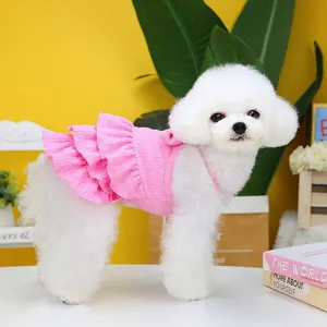 Pink tiered ruffle dog dress made of textured bubble fabric for small pets