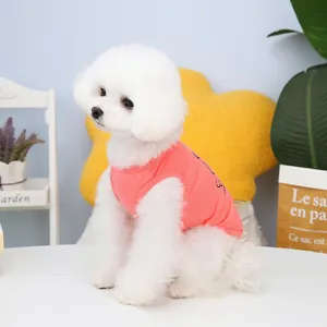 Pink cotton pet vest for small dogs and cats featuring a black letter print
