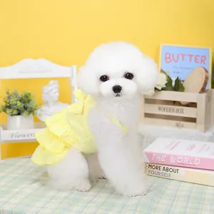 Sweet bright yellow layered pet dress with ruffles and a bow for small dogs and cats