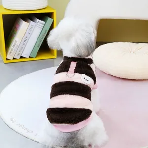 Detail of pet striped plush vest with pink D-ring harness and bear embroidery