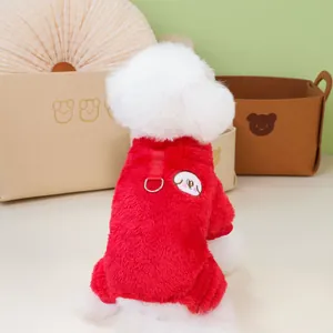 Detail of red fleece pet jumpsuit with cartoon embroidery and metal D-ring for leash