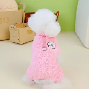 Close-up of pink plush pet romper featuring metal D-ring and cartoon puppy embroidery
