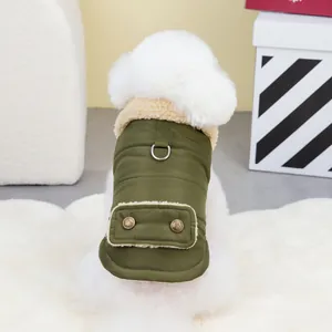 Detail of dog puffer vest featuring faux fur collar and metal D-ring for leash attachment