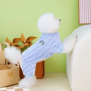 Light blue fleece pet jumpsuit for small dogs with cute dog patch and ribbed cuffs