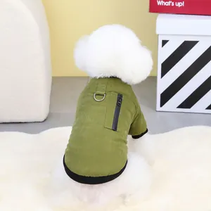 Detail of army green pet jacket featuring a metal D-ring and zipper pocket on the back