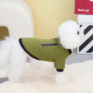 Army green pet winter jacket with zipper pocket and D-ring on white Bichon Frise