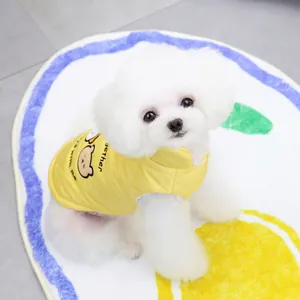 Cute yellow quilted pet vest with cartoon bear pattern worn by a small white dog