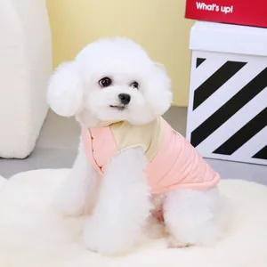 Quilted pink and beige pet vest for small dogs featuring warm cotton padding