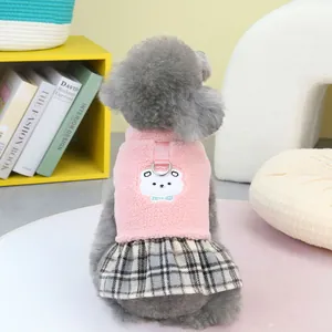 Pink fleece pet dress with white bear embroidery and plaid skirt detail for small dogs