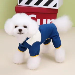 Waterproof four-legged pet raincoat in navy and white patchwork for small dogs