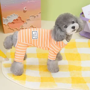 Orange striped pet jumpsuit for small dogs made of soft cotton knit with smile label