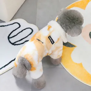 Macro detail of tie-dye warm pet jumpsuit with leash opening and plush fabric texture