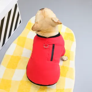 Red pet vest featuring a convenient metal D-ring for leash and a zipper pocket detail