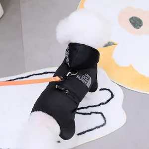 Detail of black pet winter hoodie with metal D-ring and mountain sport print design