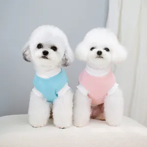 Matching blue and pink waffle knit T-shirts for small dogs and cats on white pet models