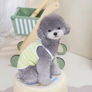 Striped pet summer vest for cats and dogs in yellow and white on a grey poodle