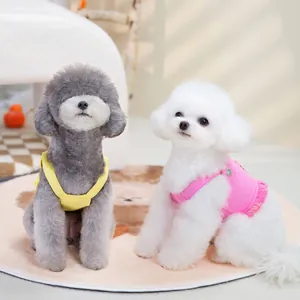 Cute candy-colored pet clothes featuring a yellow strap top and pink fringe skirt