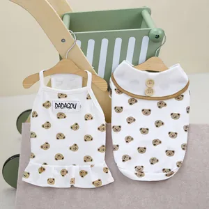 White pet shirts and dresses featuring cute brown cartoon bear prints for cats and dogs