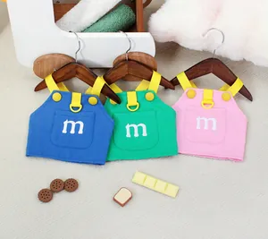 Detailed embroidery of letter m on colorful canvas pet harnesses with metal D-rings