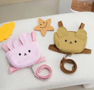 Détail de sacs à dos pour animaux avec oreilles et laisses assorties amovibles