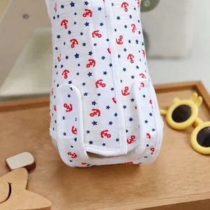 Breathable cotton baby swaddle with nautical anchor and star patterns in red and blue colors
