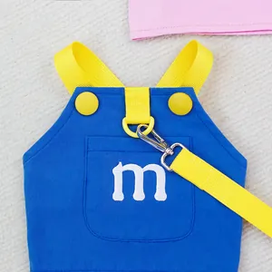 Blue and yellow pet harness set with embroidered m letter and matching leash for cats and dogs