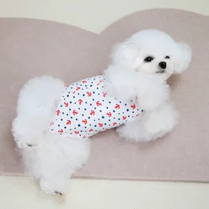 White sailor style pet recovery suit with red anchors and blue stars for small dogs