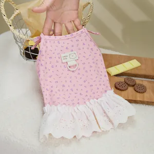 Pink floral pet dress with white lace hem and D-ring for leash attachment